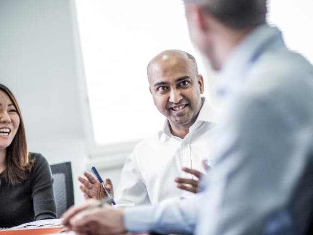 Element advisory services meeting between customers and testing experts discussing certification and compliance solutions