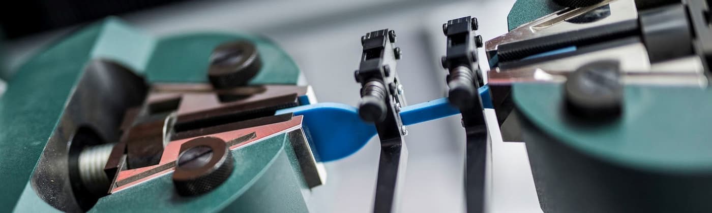 Polymer sample for building materials held in a testing frame