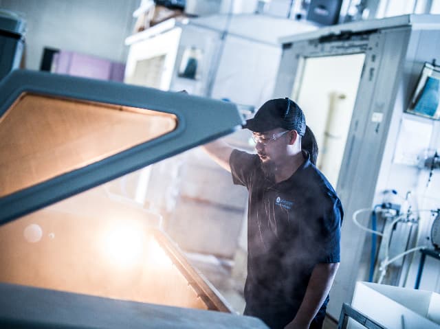 Element testing engineer operating salt fog chamber for product environmental testing